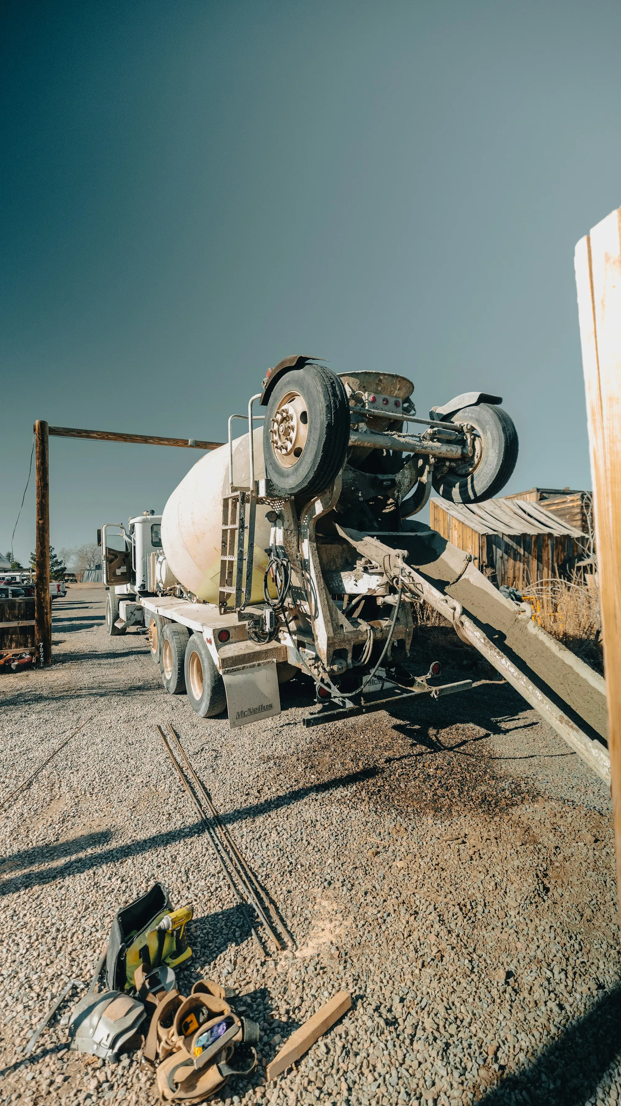 Concrete mixer truck unloading through its chute